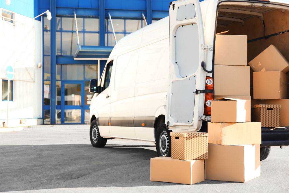 Unloading Box on Van — Reliable Removalist Services in Toronto Unloading Box on Van — Reliable Removalist Services in Toronto